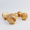 One of a kind wood turned spheres by Philip Hauser at the Center for Art in Wood