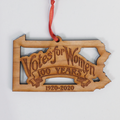 Custom laser cut wood ornaments by Nestled Pines at the Center for Art in Wood